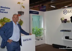 Gert-Jan Spierings of Bato Plastics in the stand where the high-wire hooks of tomato hook wrapping company van den Wijngaart were given a prominent place.                            